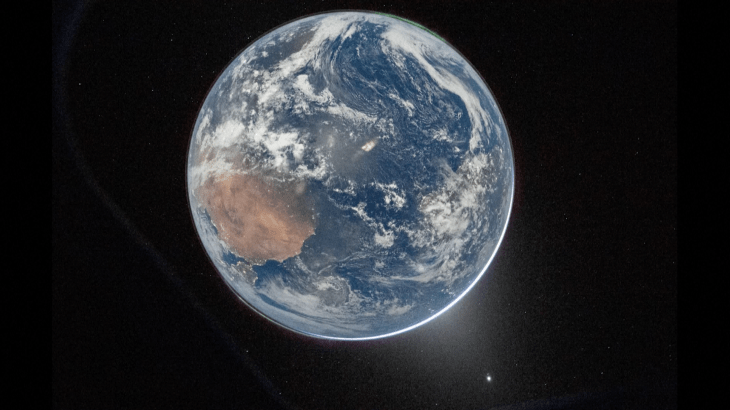 Stunning New Earth Images Captured by Artemis II: NASA Reveals the Unexpected Earth viewed from space against a black background, with clouds and a sunlit edge, above the text “Stunning New Earth Images Captured by Artemis II: NASA Reveals the Unexpected”
